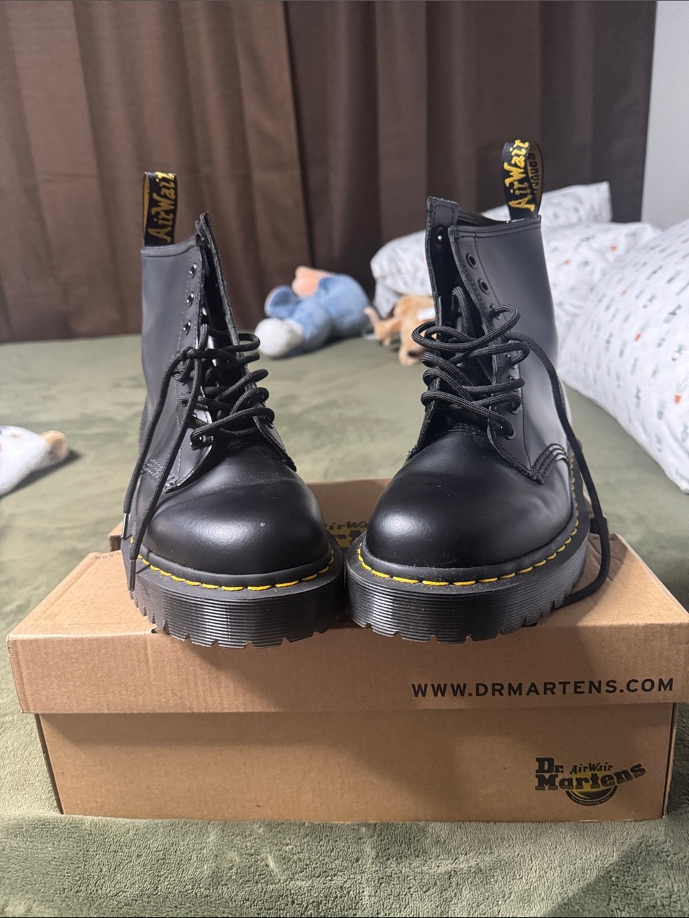 Dr. Martens Black Leather Lace-Up Platform Boots with Yellow Welt